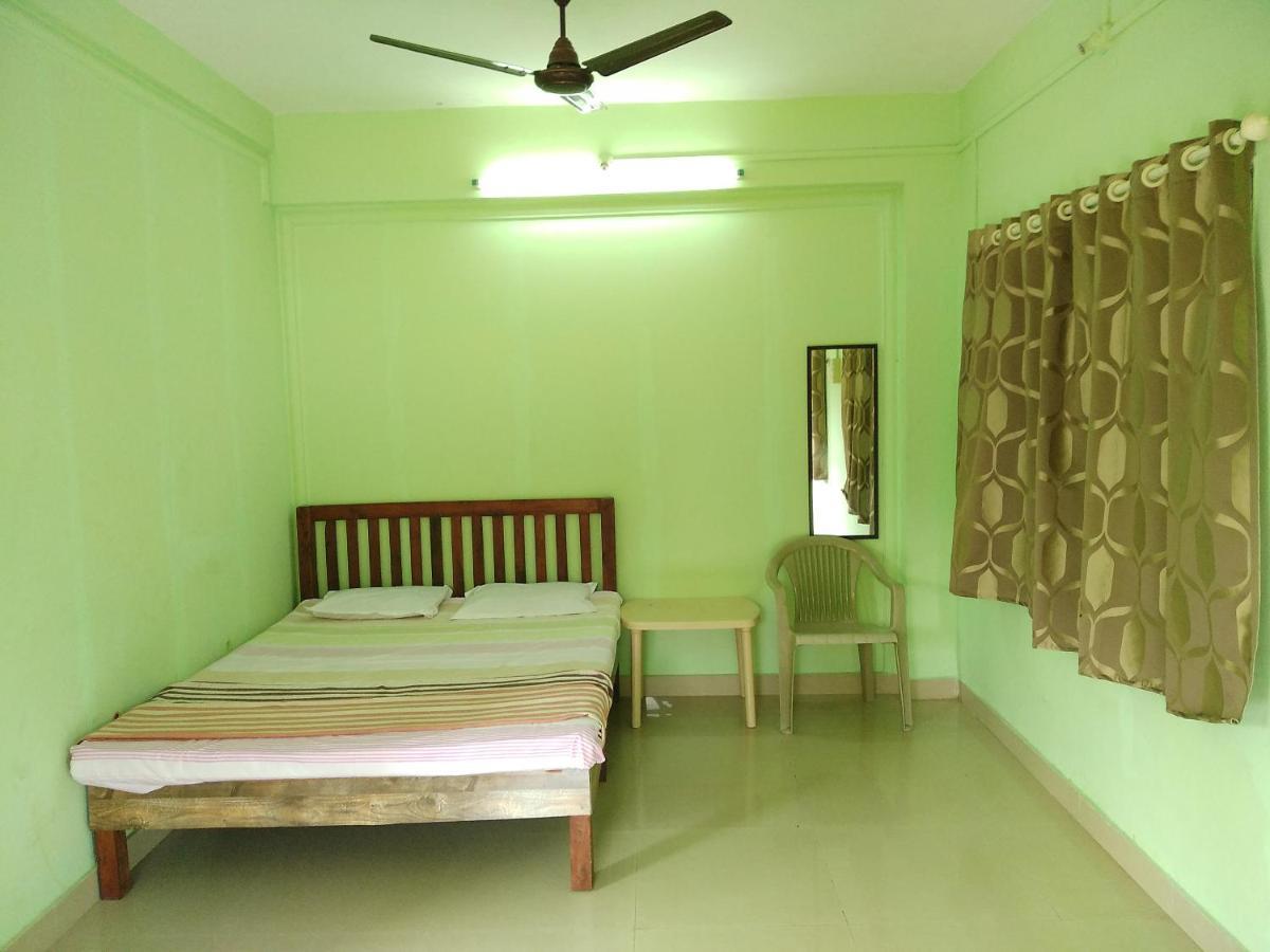 Dlite Beach Grove Cottages Алібаґ Номер фото